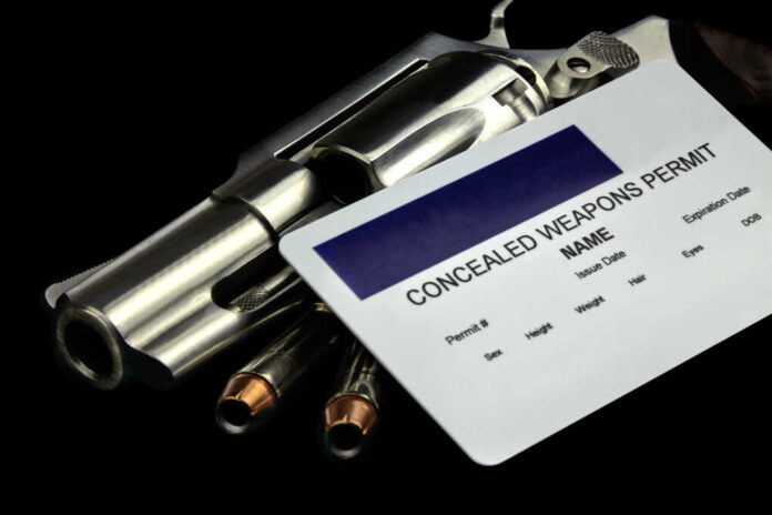 Revolver,And,Bullets,And,Concealed,Weapon,Permit.,Selective,Focus,And