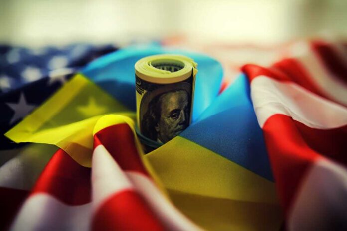 American,And,Ukrainian,Flags,,A,Pack,Of,American,Dollars.,Aid