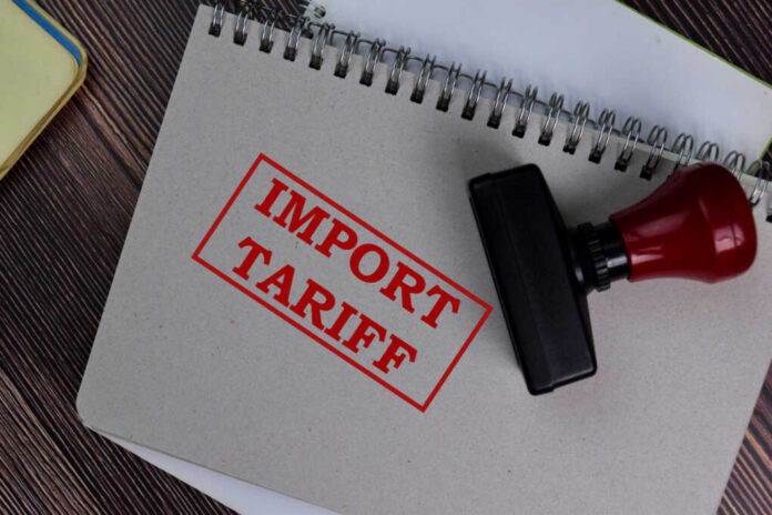Red,Handle,Rubber,Stamper,And,Import,Tariff,Text,Isolated,On