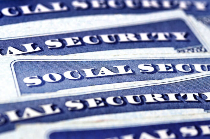 Closeup,Detail,Of,Several,Social,Security,Cards,Representing,Finances,And