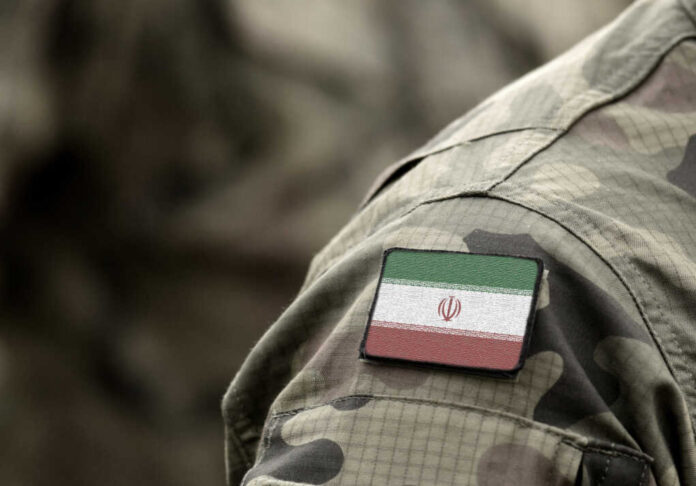 Flag,Of,Iran,On,Military,Uniform,(collage).