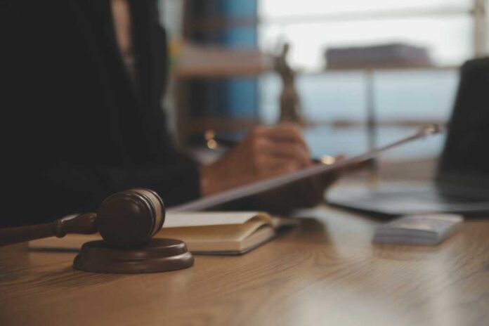 Judge,Gavel,With,Justice,Lawyers,Having,Team,Meeting,At,Law