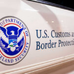 Close-up of U.S. Customs and Border Protection emblem on a vehicle