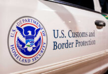 Close-up of U.S. Customs and Border Protection emblem on a vehicle