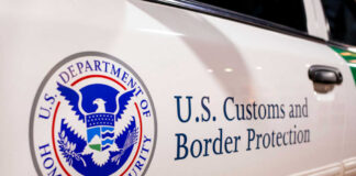 Close-up of U.S. Customs and Border Protection emblem on a vehicle