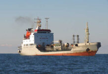 A cargo ship sailing on the ocean