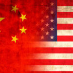 Flags of China and the USA blended together with a textured background
