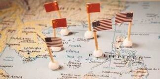 Map of the South China Sea with flags of China and the United States