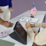 Individuals participating in the voting process at a polling station