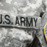 Close-up of a U.S. Army uniform with an American flag patch