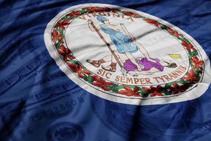 shutterstock_2546992163.jpg Virginia state flag featuring a central emblem on a blue background