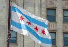 Chicago Murder Ignites Sanctuary Backlash Chicago flag waving in front of a building