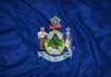 Tattoo Scandal: Leftist Candidate’s Dark Secret Exposed Maine state flag featuring its coat of arms on a blue background