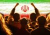 Endless Conflict: Iran’s Missile Strikes Continue Crowd of people raising their fists in front of the Iranian flag