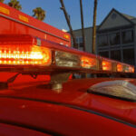 Close-up of emergency vehicle lights on a red ambulance