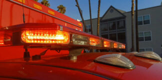 Close-up of emergency vehicle lights on a red ambulance