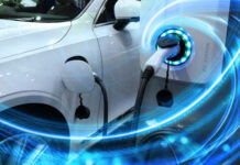 EV Interest Surges Amid Gas Price Panic Electric vehicle charging at a station with glowing indicators