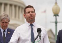 Major Backers Abandon Swalwell After Explosive Report A politician speaking at a press conference outside the Capitol building