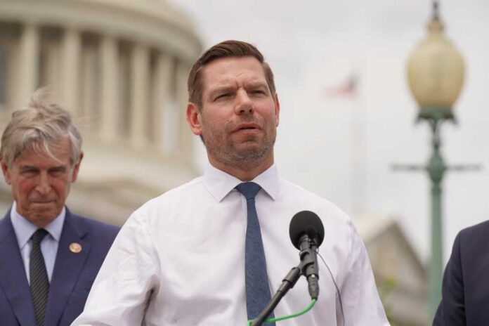 shutterstock_2184093151.jpg A politician speaking at a press conference outside the Capitol building