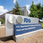 Sign for the U.S. Department of Health and Human Services Food and Drug Administration outside a building