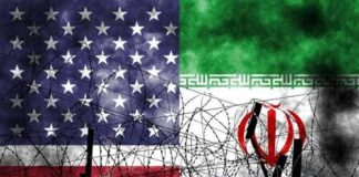 American and Iranian flags intertwined with barbed wire