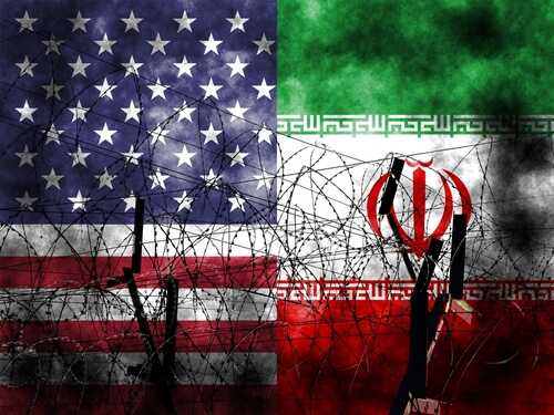 American and Iranian flags intertwined with barbed wire