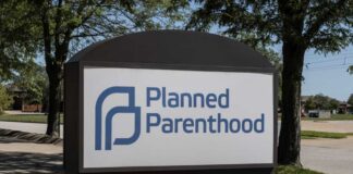 Sign for Planned Parenthood outside a healthcare facility