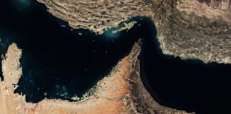 Aerial view of a coastal area with contrasting land and water features