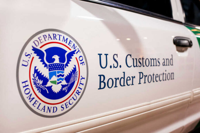 shutterstock1949856952jpg Close-up of U.S. Customs and Border Protection emblem on a vehicle