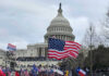 Black Athletes Urged to Boycott – Major Backlash! Crowd of protesters with American flags in front of the Capitol building