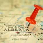 Alberta’s Wild Bid: Could It Break Canada? Red pushpin marking Alberta on a map