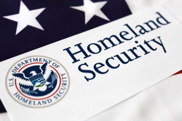 Close-up of the U.S. Department of Homeland Security logo on a flag background