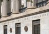 Argentina Bailout Ignites Fear of U.S. Power Abuse Facade of the Department of the Treasury with columns and engraved text