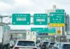 Traffic signs directing vehicles towards G W Bridge and Hudson Parkway