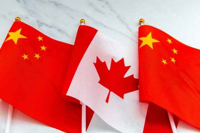 Flags of China and Canada displayed together