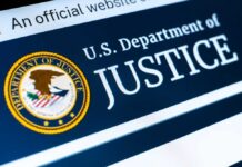 Close-up of the U.S. Department of Justice logo on a website
