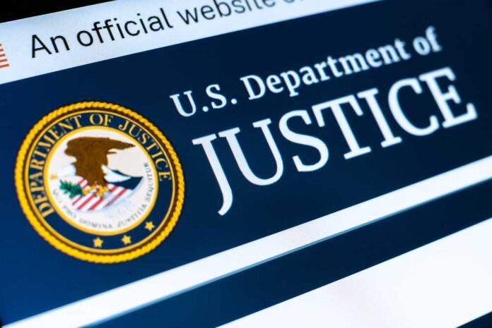 Close-up of the U.S. Department of Justice logo on a website