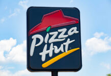 Pizza Delivery NIGHTMARE — AI Blamed for $100M Loss! restaurant sign with red roof logo against blue sky