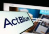 Congress Demands Answers From ActBlue Close-up of ActBlue logo on a mobile device with a website in the background