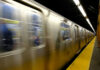 Rush-To-Impress Overhaul Hits LA Metro A subway train in motion at a station with a yellow platform