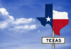 Data Center Domino Threatens Texas Texas state outline with flag colors and a road sign indicating Texas