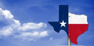 Texas state outline with flag colors and a road sign indicating Texas