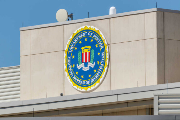 FBI emblem displayed on the exterior of a government building