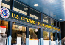 Trump’s Denaturalization Machine Roars Back Entrance of the U.S. Citizenship and Immigration Services office with signage