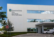 20-Year Freeze Stuns Cleveland Clinic Cleveland Clinic building exterior with entrance and parked white van