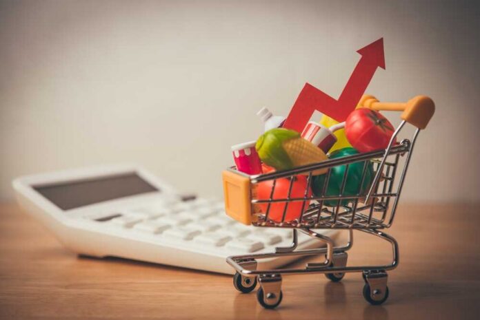 Red,Arrow,Growth,Chart,,Food,,Drinks,,Vegetables,,Fruits,In,Supermarket A shopping cart filled with colorful grocery items next to a calculator and an upward trend arrow