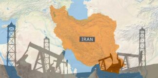 Map of Iran highlighting oil production areas with oil rigs in the foreground