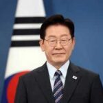 South Korea Probes World Cup Collapse Man in suit with glasses standing before South Korean flag