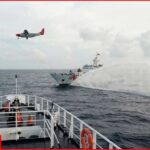 China Targets Philippine Ship Again Chinese Coast Guard fires water cannon at Philippines government ship in South China Sea