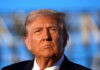 Election Intelligence Fuels New Political Fight Close-up portrait of a serious-looking political figure outdoors